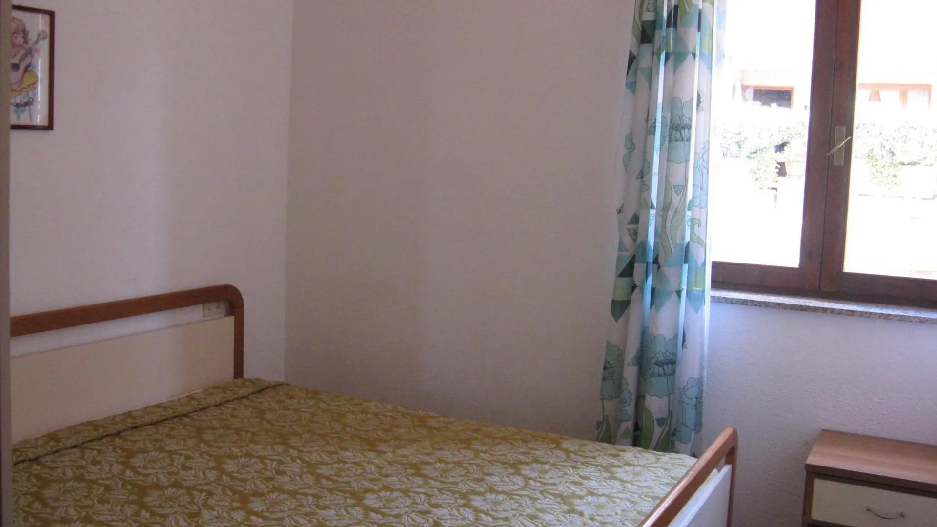 Borgo Spiaggia Isola Rossa Apartamento